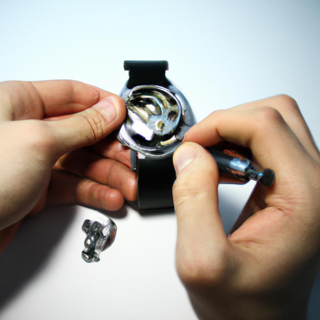 Person fixing a watch display