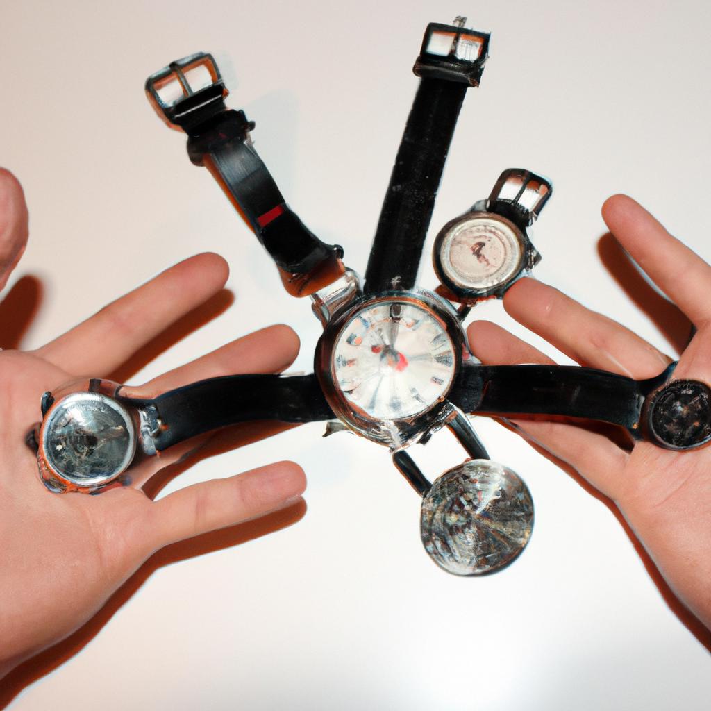 Person holding different watch movements